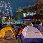 Protesters spend night outside Burien City Hall in opposition to city's ordinance against public camping