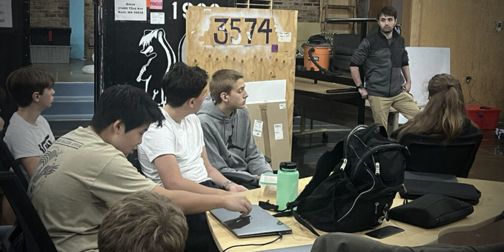 Thomas DeSilva, one of the co-captains leading Skunk Works, leads the team's mentees through their bi-weekly meeting.