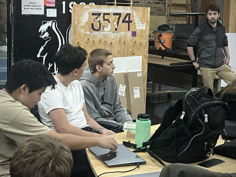 Thomas DeSilva, one of the co-captains leading Skunk Works, leads the team's mentees through their bi-weekly meeting.