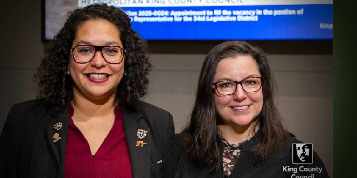 Brianna Thomas (left) is the new State Representative for the 34th Legislative District. She took her oath of office from Judge Rebecca C. Robertson (right). Photo courtesy King County Council.