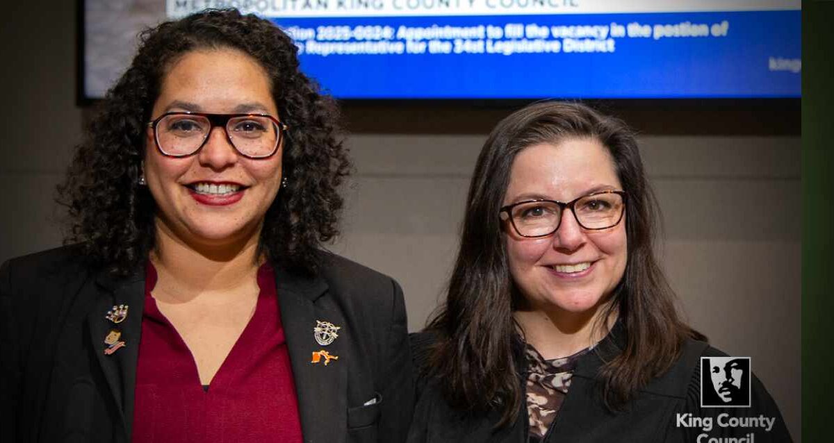 Brianna Thomas (left) is the new State Representative for the 34th Legislative District. She took her oath of office from Judge Rebecca C. Robertson (right). Photo courtesy King County Council.