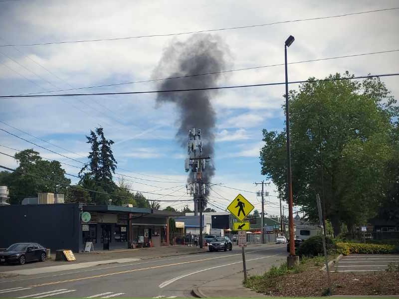 White Center house fire contained after firefighters spot smoke while responding to another call